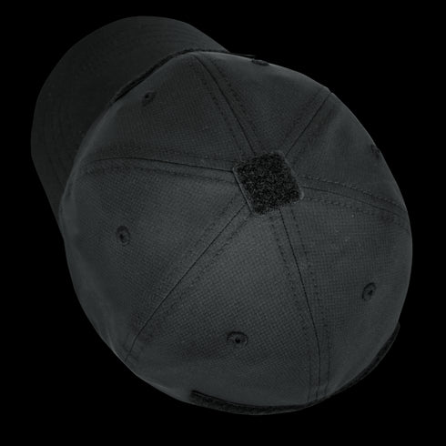The Condor Cool Mesh Tactical Cap in black is shown from above, highlighting its top stitching, ventilation holes, and a central rectangular patch—ideal for EDC or military use.
